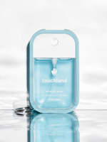 Touchland blue sandalwood power mist in blue mist case on white background