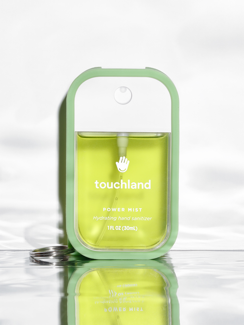 Touchland mist case green in white packaging on white background#skip