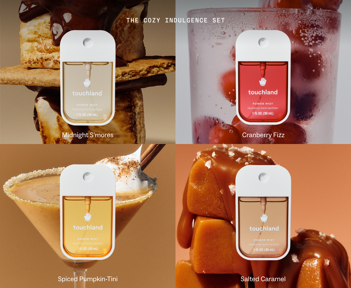 Four fragrance mist packets labeled touchland are arranged in a 2x2 collage with themed food and drink backgrounds. The top-left panel shows a packet over a toasted pastry with the scent Midnight S'mores; the top-right shows a packet over a frosted drink with cranberries, labeled Cranberry Fizz; the bottom-left shows a packet over a spiced cocktail, labeled Spiced Pumpkin-Tini; the bottom-right shows a packet over caramel drizzle, labeled Salted Caramel.