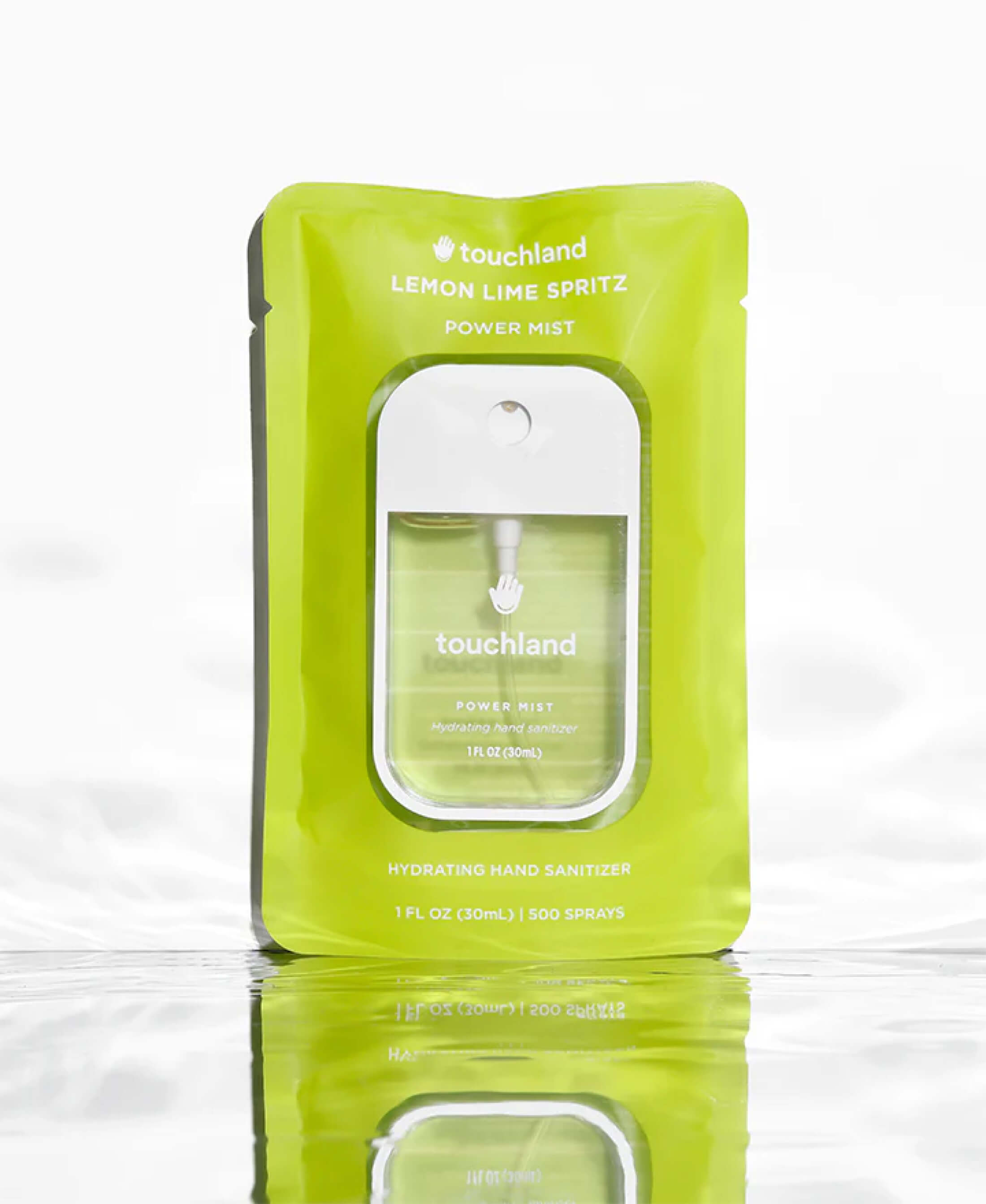 Touchland lemon lime spritz yellow hand sanitizer in yellow packaging on white background
