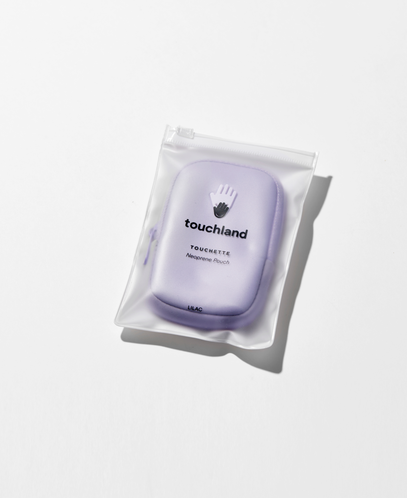 Light purple Touchette in packaging. background