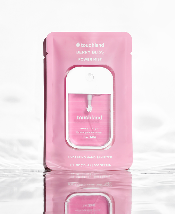Berry bliss pink power mist in pink packaging on white background