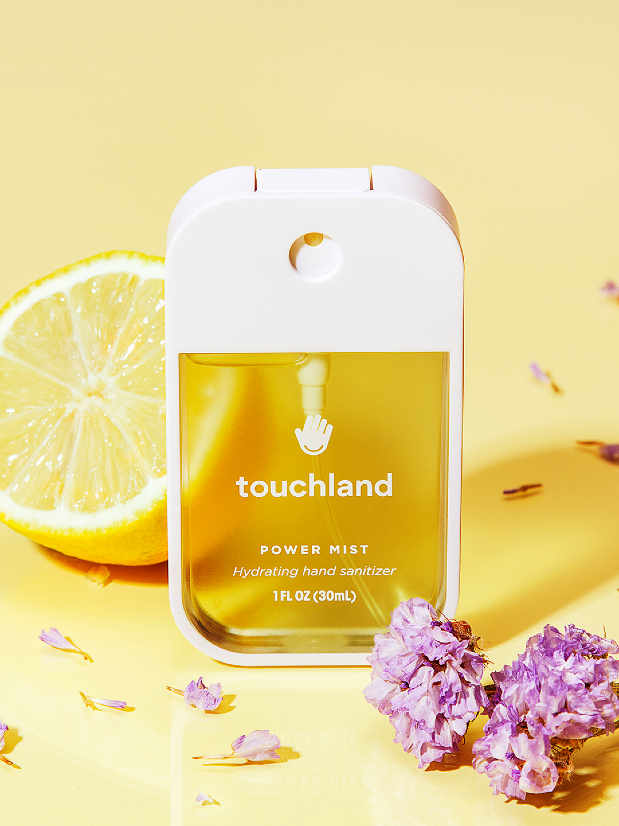 Lemon lime spritz yellow power mist with lemon and lavender on yellow background